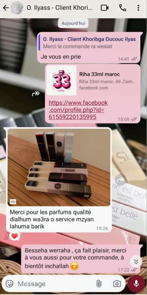 Capture d'écran WhatsApp d'un client satisfait de la tenue longue durée de son parfum 33ml pour homme.